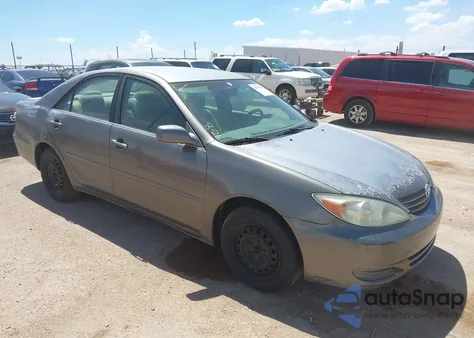 2003 Toyota Camry Le z USA, uszkodzony, nr VIN 4T1BE30K13U725595